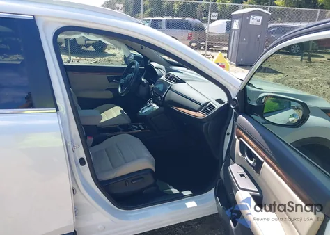 2020 Honda Cr-V Hybrid Touring from USA, damaged, VIN 7FART6H92LE024749